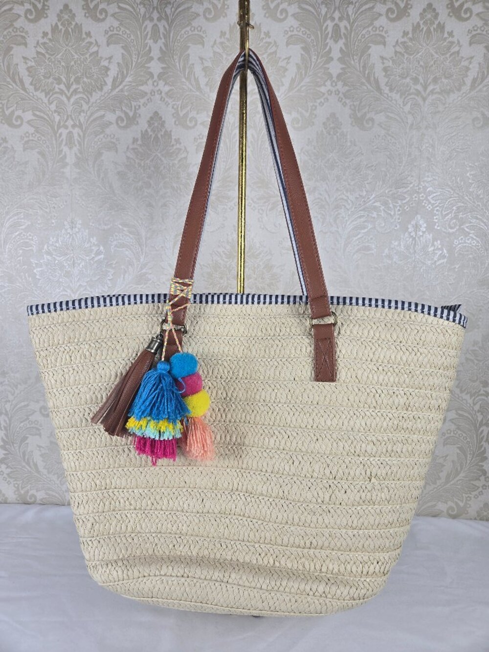 Straw Double Handled Tote Bag Blue White Striped Trim and Lining Pompom Tassel